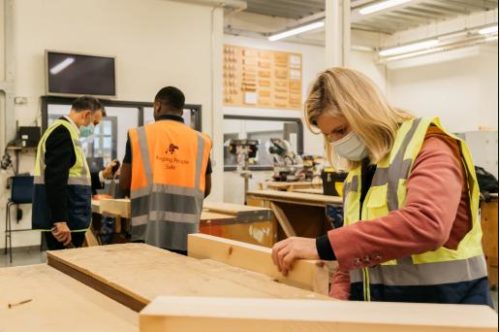 Lady woodworking